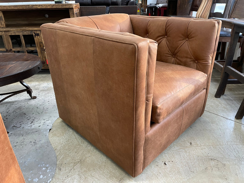 Leather swivel accent chair with tufted upholstery, model 7773L42 by Mayo Furniture, featuring a stylish design and comfortable seating.
