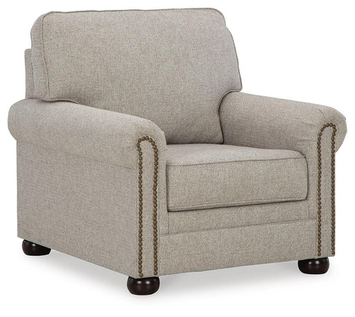 Ashley Furniture Gaelon Chair with plush upholstered seat and wooden legs, shown from an angled side view.