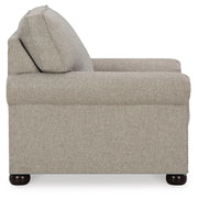 Ashley Furniture Gaelon Chair with wooden legs and plush upholstery, shown from a side angle on a plain background.