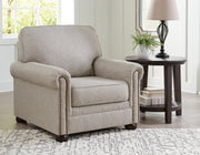 Ashley Furniture Gaelon Chair with upholstered fabric and wooden legs, featuring a modern design and plush cushioning.