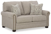 Ashley Furniture Gaelon loveseat with plush fabric and modern design, shown from an angled side view.