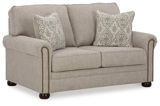 Ashley Furniture Gaelon loveseat with plush fabric and modern design, shown from an angled side view.