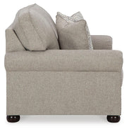Ashley Furniture Gaelon Loveseat with plush fabric and modern design, shown from a side angle in the image.
