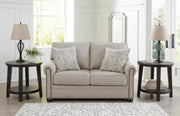 Ashley Furniture Gaelon Loveseat with plush fabric and modern design, featuring soft cushions and sleek armrests.