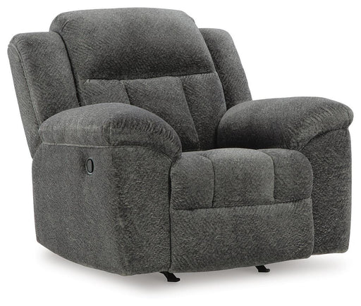 Ashley Furniture Frohn recliner in tan fabric, shown from an angle with closed footrest and cushioned armrests.