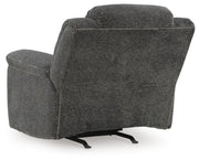 Ashley Furniture Frohn recliner with plush fabric and padded armrests, shown from the back with a comfortable, stylish design.