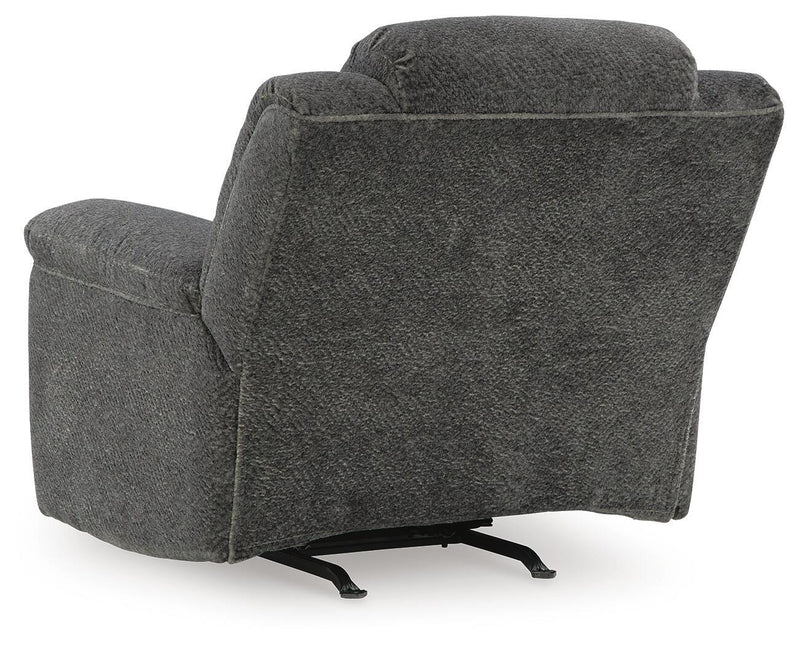 Ashley Furniture Frohn recliner with plush fabric and padded armrests, shown from the back with a comfortable, stylish design.