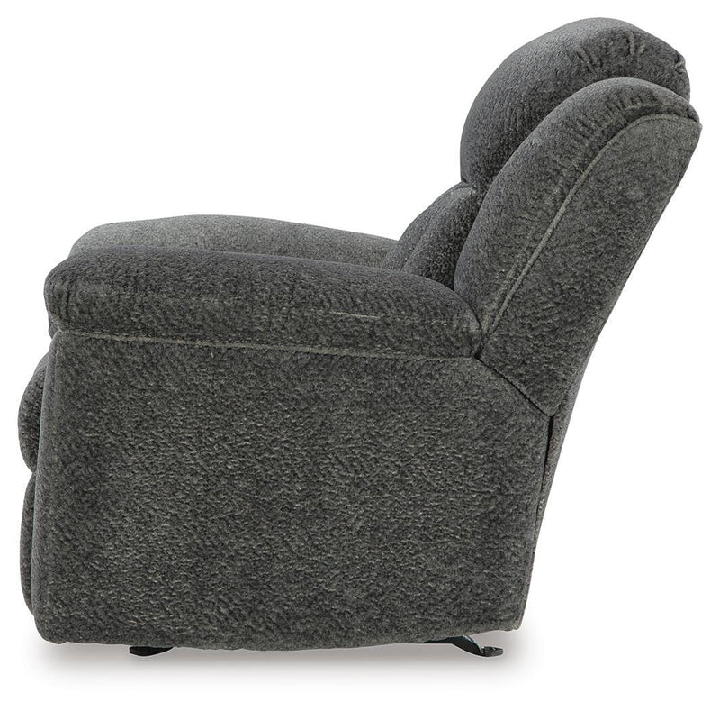 Ashley Furniture Frohn recliner with plush upholstery, showing a side view of the comfortable, modern recliner in a living room setting.