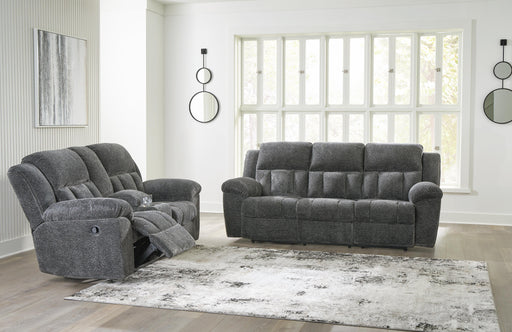 Ashley Furniture Frohn Living Room Set featuring a sofa and loveseat with neutral upholstery and modern design.