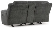 Ashley Furniture Frohn reclining loveseat with built-in console, showing plush upholstery and ergonomic design for comfortable seating.