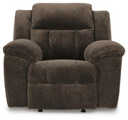 Ashley Furniture Frohn recliner with plush fabric upholstery and padded armrests, shown in a head-on view.