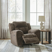 Open Ashley Furniture Frohn recliner showing plush upholstery, padded armrests, and reclining mechanism for comfortable seating.