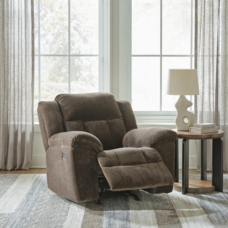 Open Ashley Furniture Frohn recliner showing plush upholstery, padded armrests, and reclining mechanism for comfortable seating.