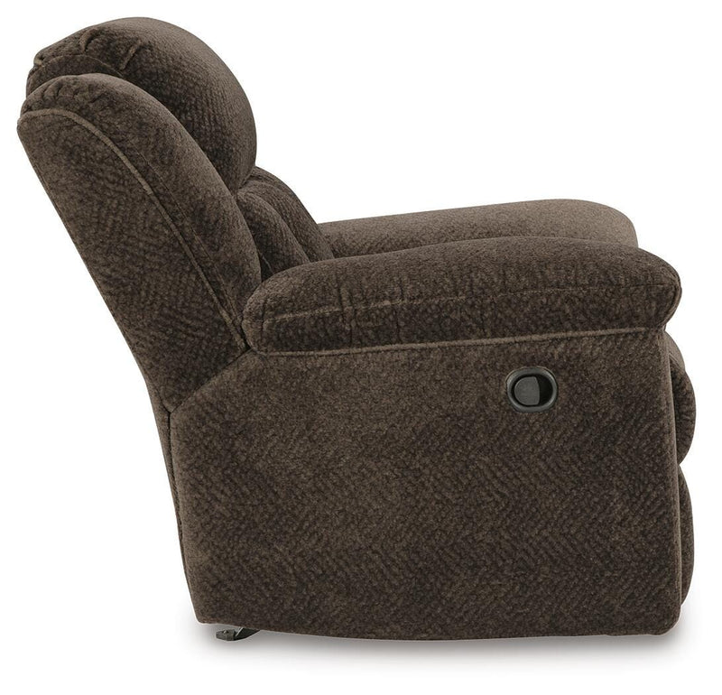 Ashley Furniture Frohn recliner with plush upholstery and padded armrests, shown from a side view.