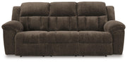 Ashley Furniture Frohn reclining sofa with plush cushions and wide armrests, shown from a head-on view.
