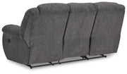 Ashley Furniture Foreside Reclining Sofa, view of back showing plush upholstery and reclining mechanism in a modern living room setting.