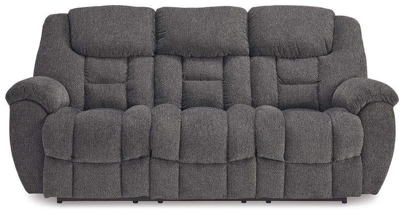 Ashley Furniture Foreside Reclining Sofa with plush cushions and reclining feature, shown from the front.
