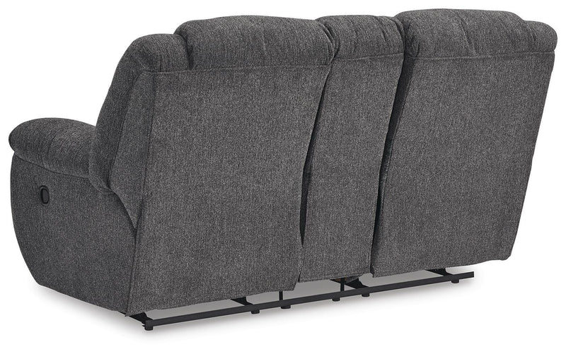 Ashley Furniture Foreside reclining loveseat with console, showing plush upholstery and built-in cup holders.