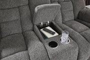 Close-up of Ashley Furniture Foreside Reclining Loveseat with console, showing comfortable upholstery and built-in armrest console.