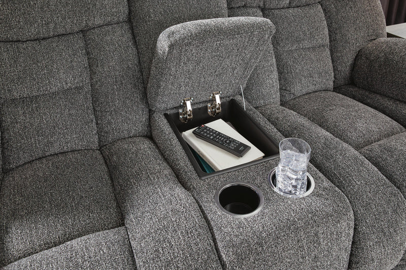 Close-up of Ashley Furniture Foreside Reclining Loveseat with console, showing comfortable upholstery and built-in armrest console.