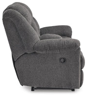 Ashley Furniture Foreside reclining loveseat with console, showing plush fabric, reclining mechanism, and built-in center console.
