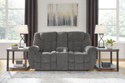 Ashley Furniture Foreside Reclining Loveseat with Console, shown in a cozy living room setting.