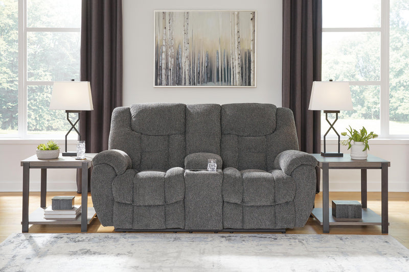 Ashley Furniture Foreside Reclining Loveseat with Console, shown in a cozy living room setting.