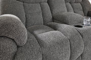 Ashley Furniture Foreside reclining loveseat with console, plush upholstery, and cushioned armrests for comfortable seating.