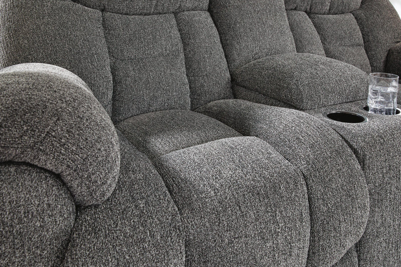 Ashley Furniture Foreside reclining loveseat with console, plush upholstery, and cushioned armrests for comfortable seating.