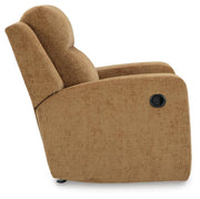 Ashley Furniture Kanlow recliner with plush fabric and cushioned armrests, shown from a side view in a living room setting.