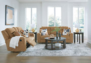 Ashley Furniture Kanlow living room set with sofa, loveseat, and armchair in neutral fabric, arranged in a modern living room setting.