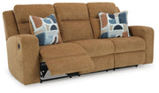 Ashley Furniture Kanlow reclining sofa shown from an angle with open recliners, featuring plush cushions and a modern design.