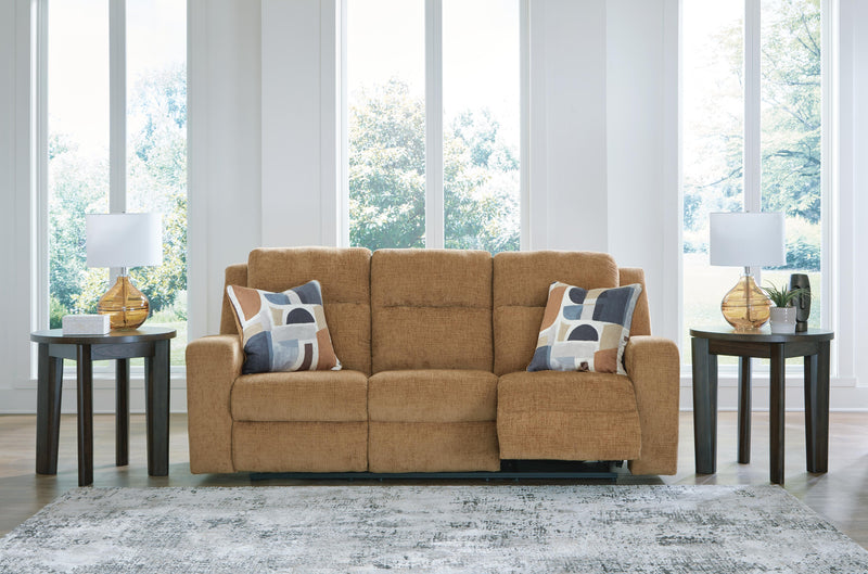 Ashley Furniture Kanlow reclining sofa with plush fabric, showing open position and comfortable seating.