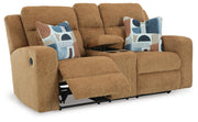 Ashley Furniture Kanlow reclining loveseat with console, shown from an open angle highlighting plush fabric and built-in cup holders.