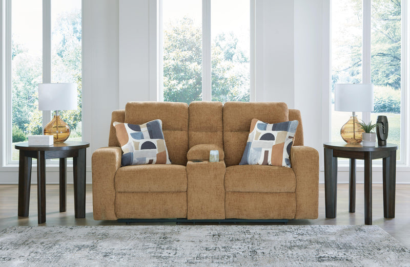 Ashley Furniture Kanlow reclining loveseat with built-in console, plush upholstery, and cushioned armrests for comfortable seating