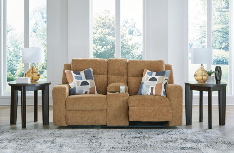 Ashley Furniture Kanlow reclining loveseat with console, showing open position, plush fabric, and built-in cup holders for comfort.