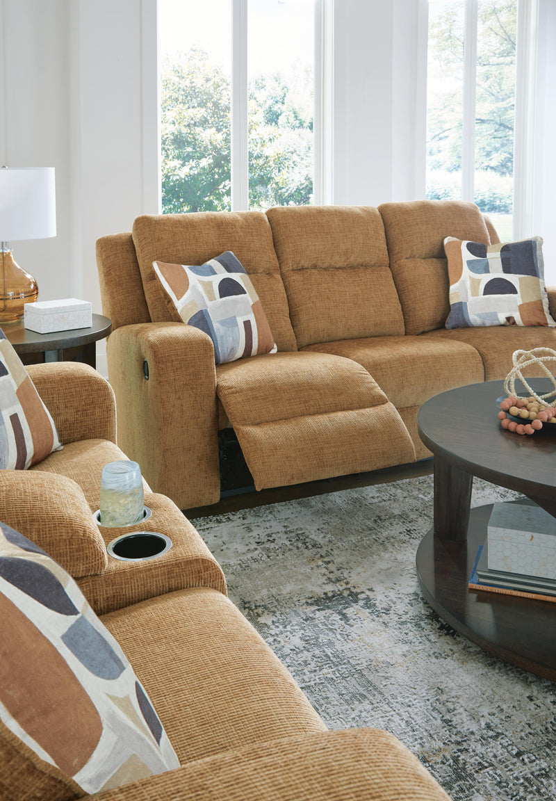 Ashley Furniture Kanlow living room set with sofa and loveseat in a modern design, shown in a cozy home setting.