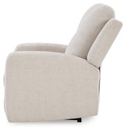 Ashley Furniture Danum Recliner in beige fabric with plush cushions and wooden legs, shown from a side angle.