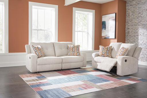 Ashley Furniture Danum upholstery package featuring a modern living room set with sofa, loveseat, and armchair in neutral fabric.