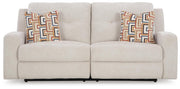 Ashley Furniture Danum reclining sofa with plush cushions and modern design, shown from a head-on view.