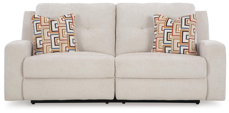 Ashley Furniture Danum reclining sofa with plush cushions and modern design, shown from a head-on view.