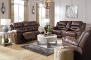 Ashley Furniture Stoneland living room set with sofa, loveseat, and armchair in a modern design.