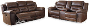Ashley Furniture Stoneland living room set with plush sofa, armchair, and coffee table in a modern, stylish living space.