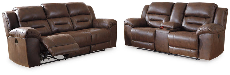 Ashley Furniture Stoneland living room set with plush sofa, armchair, and coffee table in a modern, stylish living space.