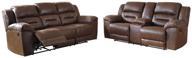 Ashley Furniture Stoneland living room set with sofa, loveseat, and coffee table arranged in a modern, stylish living space.