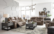 Ashley Furniture Stoneland living room set with sofa, loveseat, and armchair in a modern fabric upholstery.