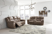 Ashley Furniture Stoneland living room set with sofa and armchair, featuring neutral fabric and modern design.