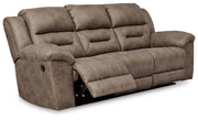 Ashley Furniture Stoneland living room set with sofa and armchair, stylish upholstery, and modern design.