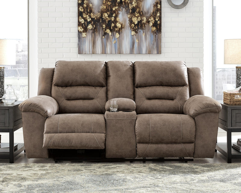 Ashley Furniture Stoneland Living Room Set with sofa and loveseat in a modern fabric, seen in a well-lit living room setting