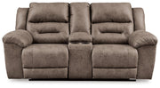 Ashley Furniture Stoneland living room set with sofa and armchair, featuring neutral fabric upholstery and modern design.